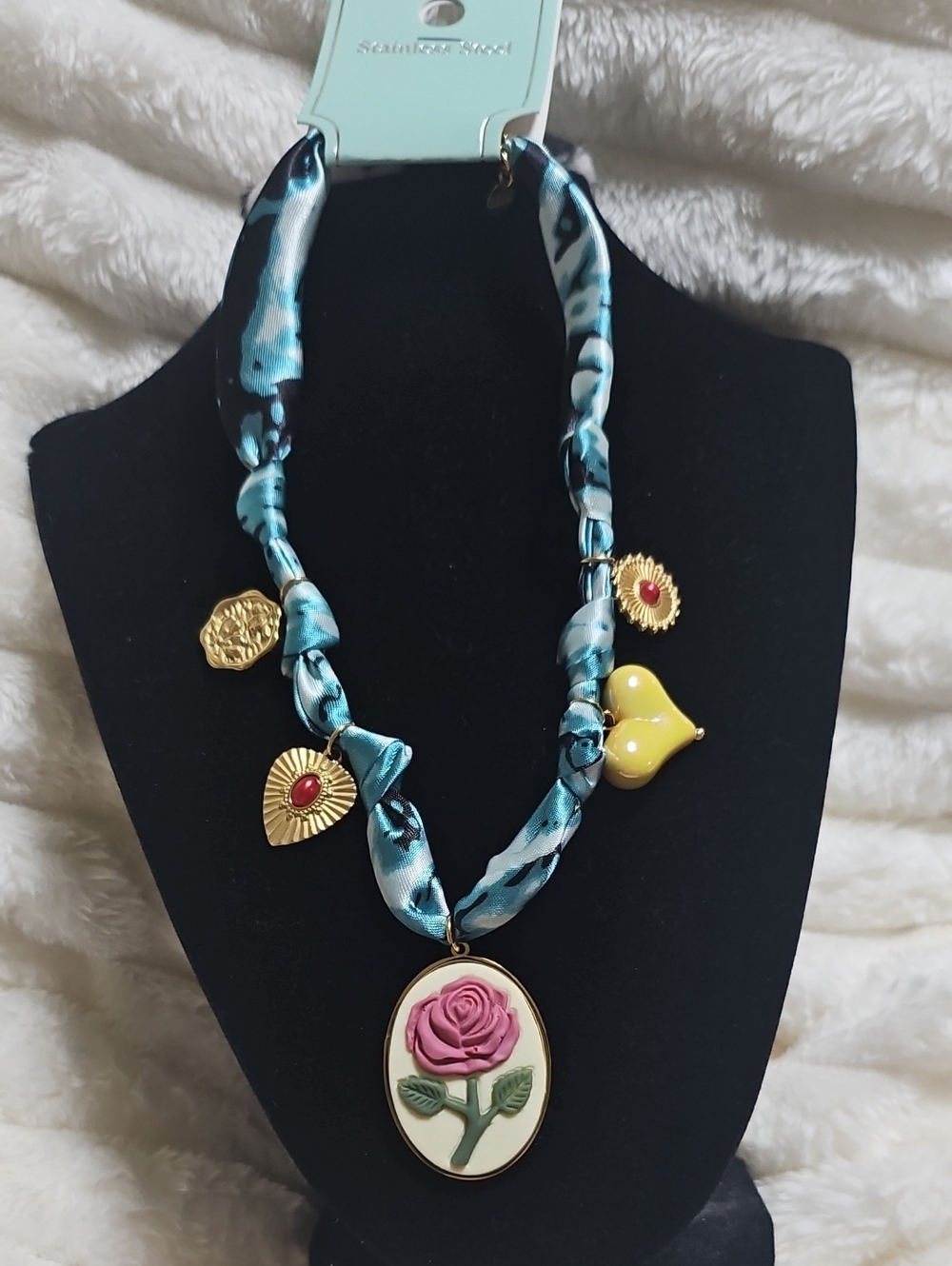 Source Unknown Teal Ribbon Necklace with Pink Rose Pendant and Gold Accents